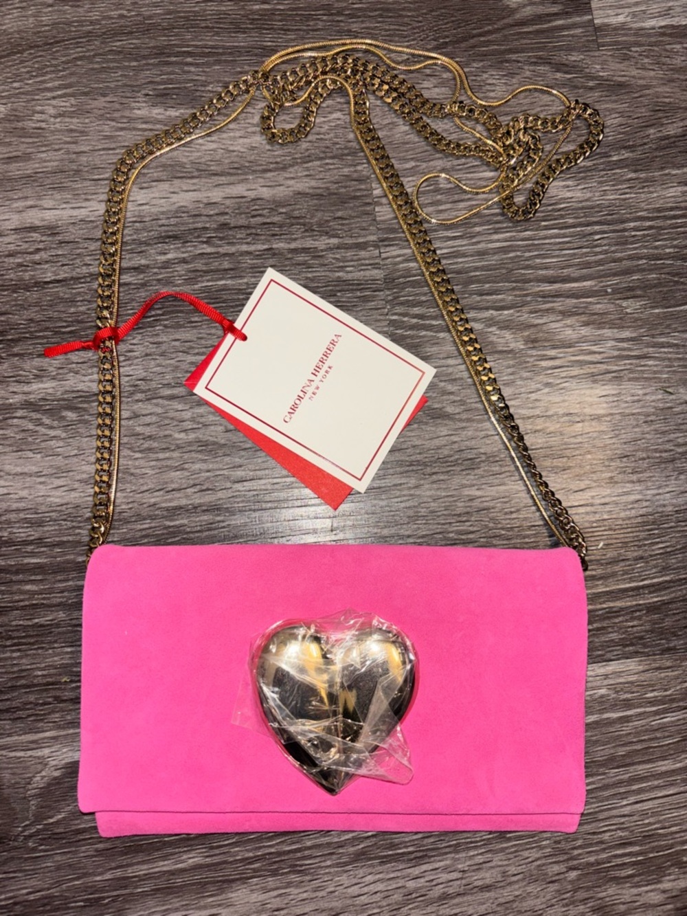 Carolina Herrera Hot Pink Suede Crossbody with Gold Heart Detail